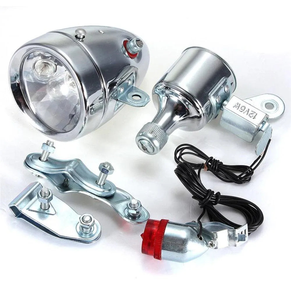Silver bicycle dynamo generator light with friction drive mechanism and waterproof housing for 12V lighting systems