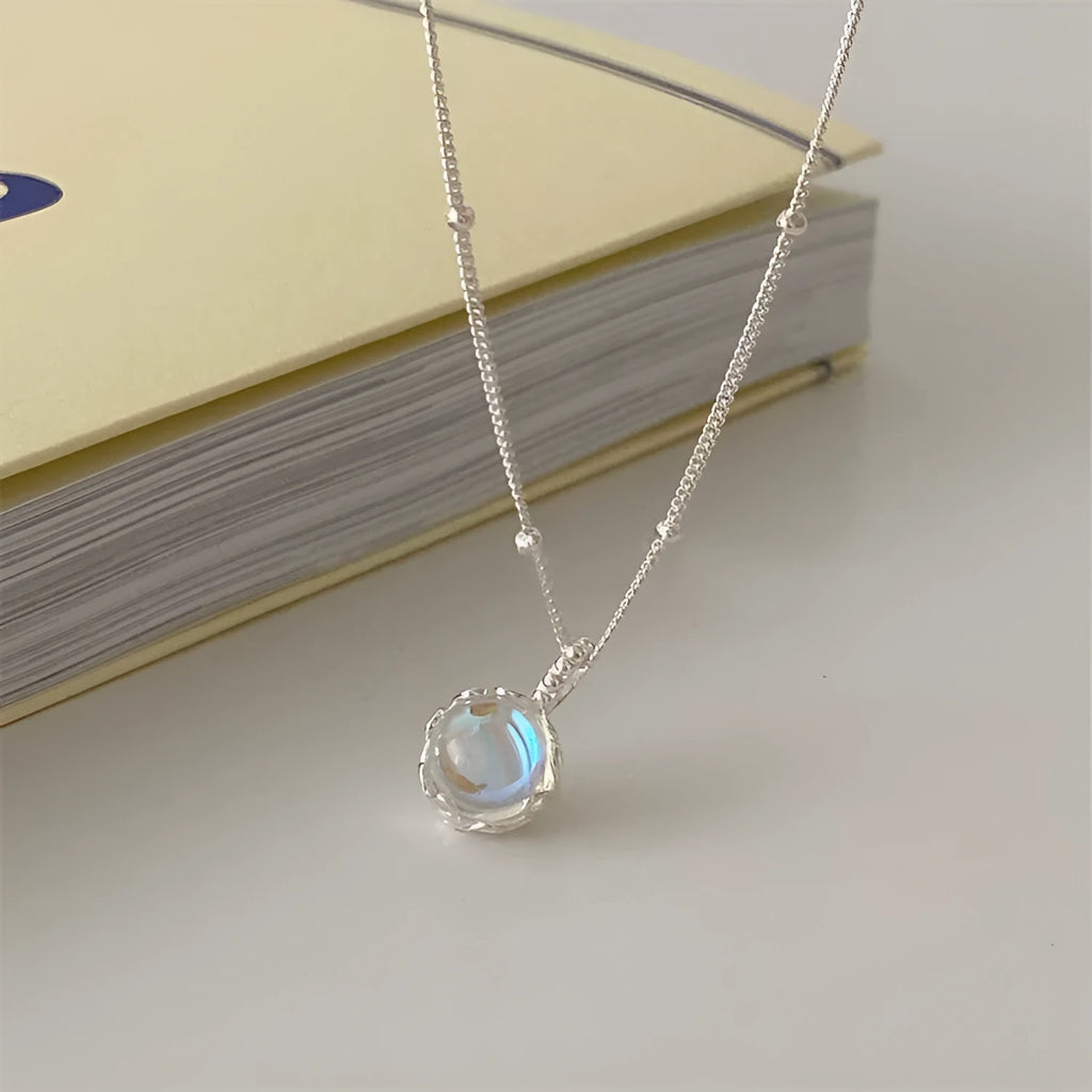 Women's silver necklace with geometry ornamental stone pendant on curb chain
