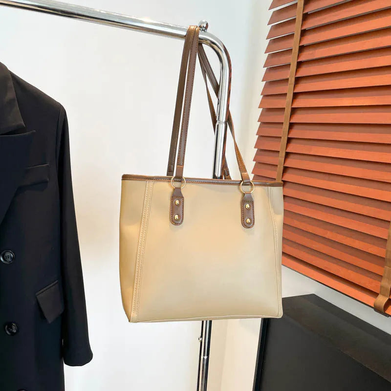 Korean style horizontal square shoulder underarm bag in PU with sandwich pocket, shown in beige colour.