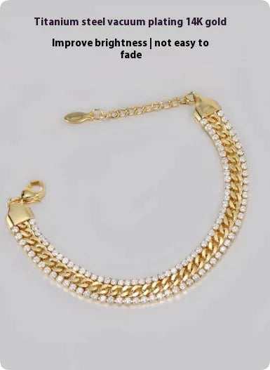 Gold plated tennis bracelet for men and women with stone inlay on a wrist.