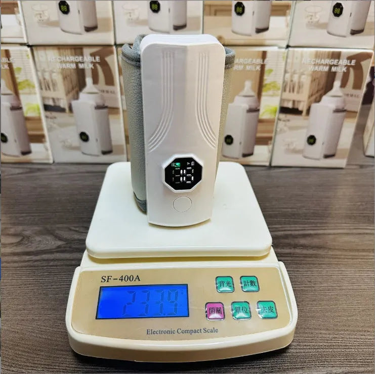 Gray and white electric car milk warmer with PU leather finish and constant temperature heating for baby bottles.