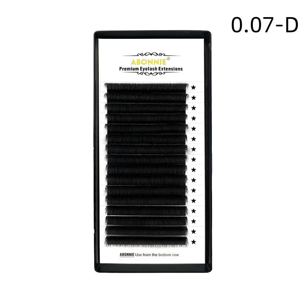 Close-up of dense 16-row false eyelashes with matte wool texture in mink hair, showing length options.