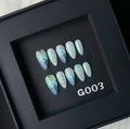 Blue shell-design plastic artificial nail tips set with four size options XS S M L