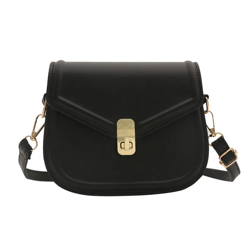Soft PU leather clamshell shoulder messenger bag in a horizontal square shape.