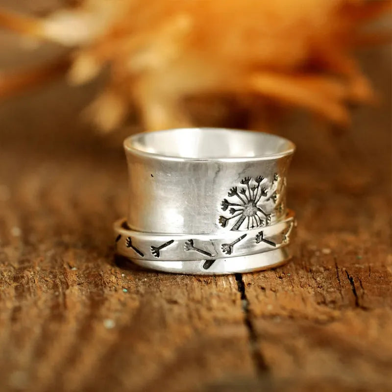 Silver electroplated flower fashion ring in alloy, available in sizes 7 through 11.