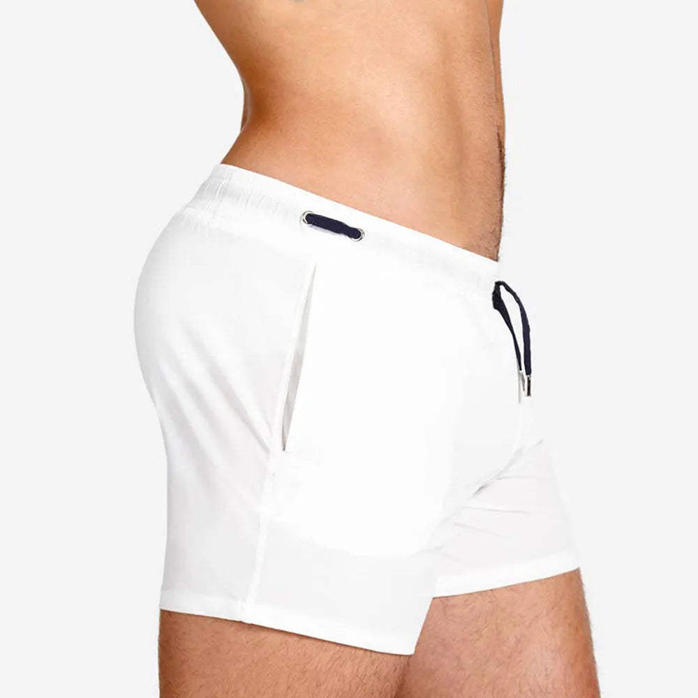 Polyester sports shorts with mesh lining in Army Green colour, shown flat.