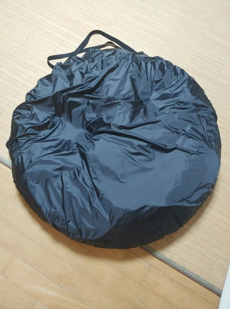 Black pop-up car tail tent with quick-throw setup shown connected to vehicle