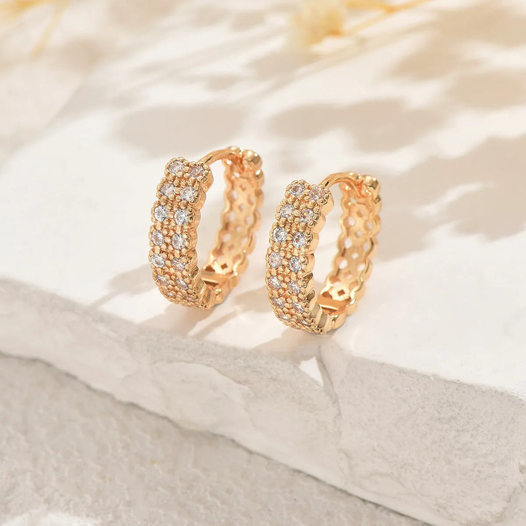 Geometric pattern copper ear studs with round, dot and ring elements in colour DE20288