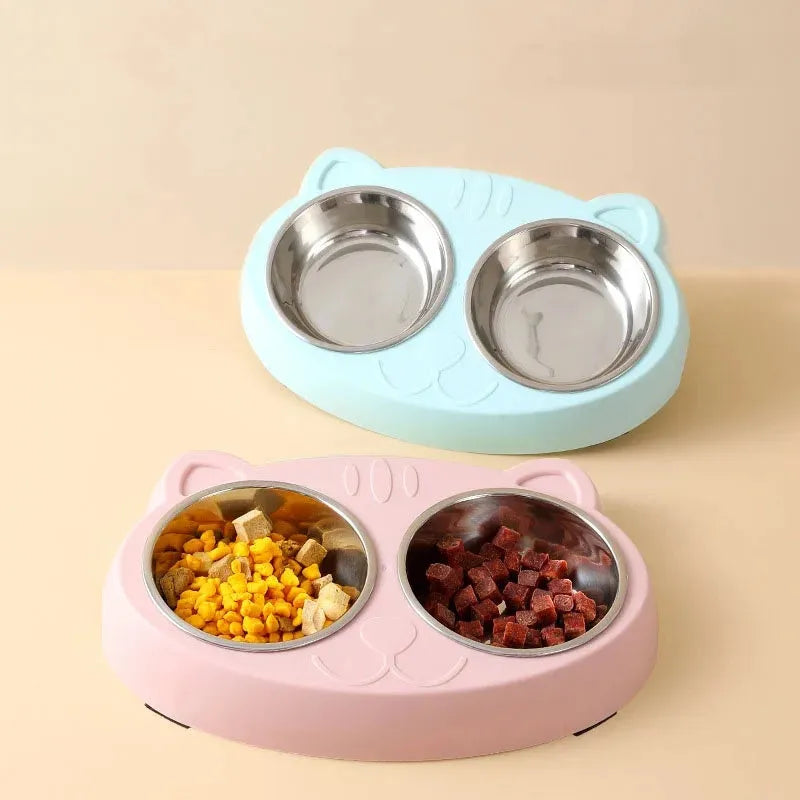 Blue, green, and pink macaron-shaped plastic double bowl pet feeding tray for cats and dogs.