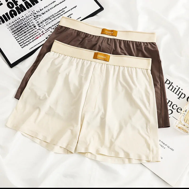 Pack of three men's loose fit solid colour underwear in ice silk fabric.