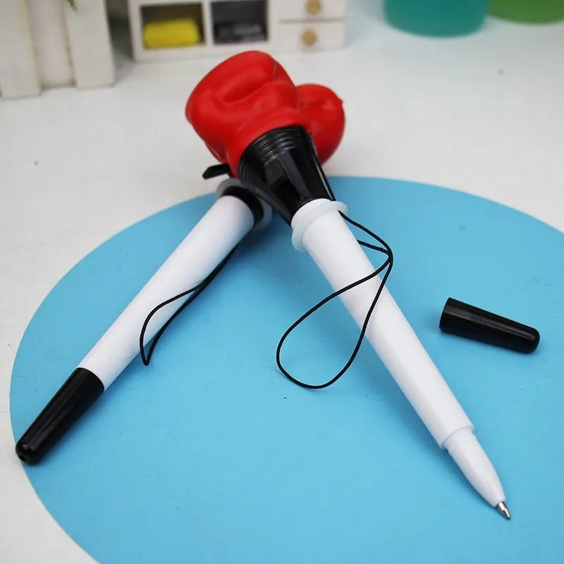 Four boxing press ejection pens with pressure relief mechanism and black ink refills
