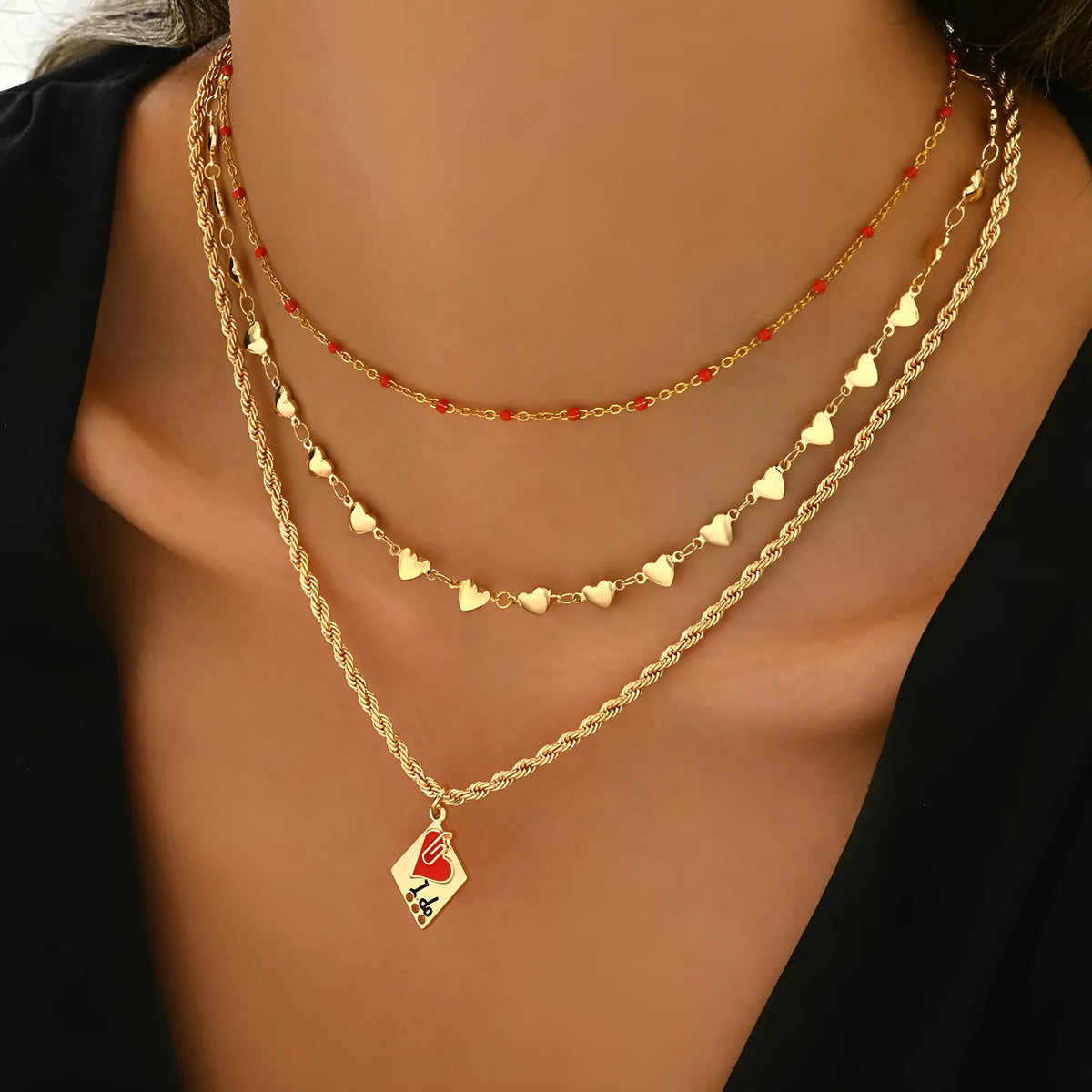 Golden three-layer adjustable clavicle chain necklace with geometric heart pendant