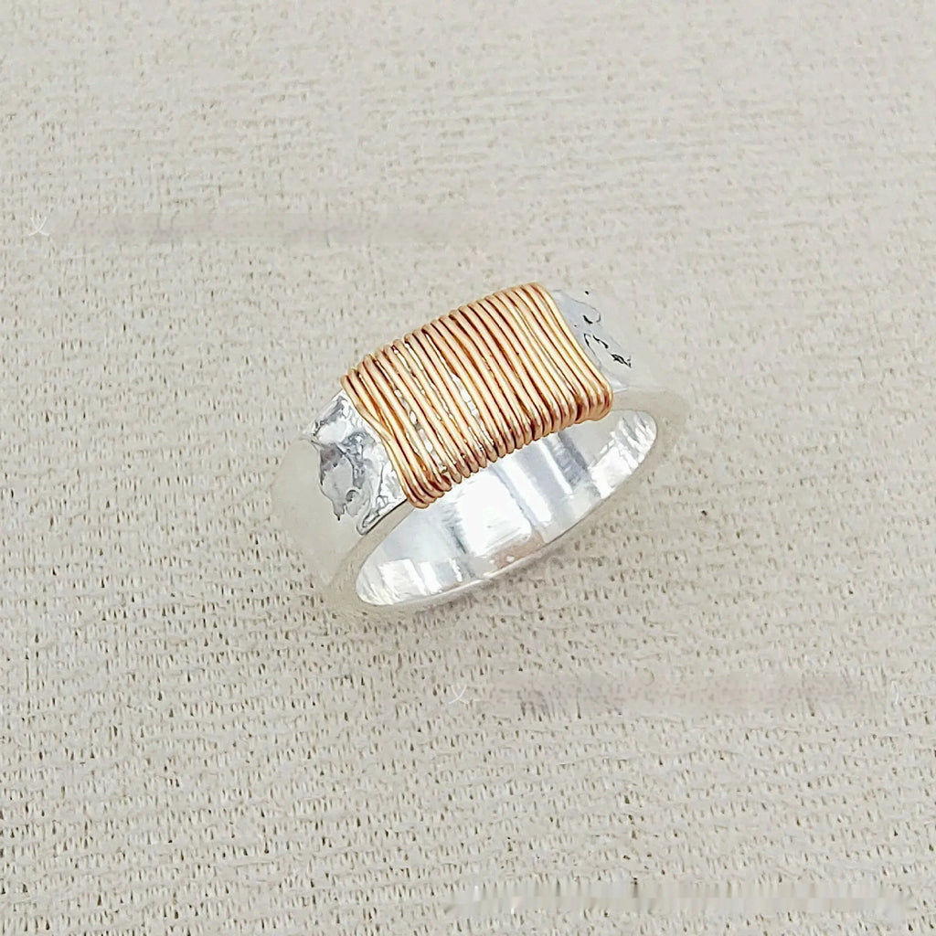 Copper bracelet ring with irregular coil design and electroplated silver-gold finish