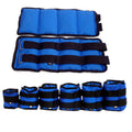 A pair of Oxford cloth legging sandbag weights for athletic training, shown with weight options from 1kg to 6kg.
