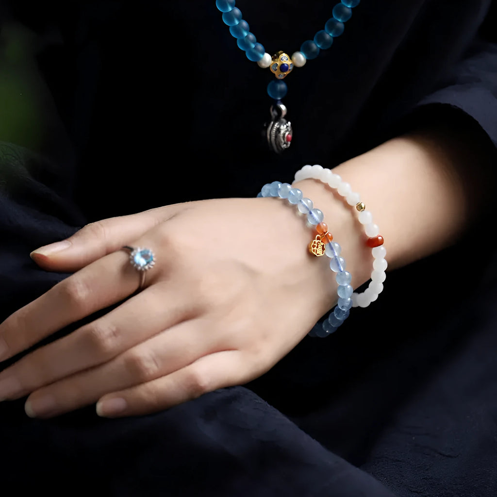 Ice translucent aquamarine crystal bracelet with 8mm round beads and sequin elements