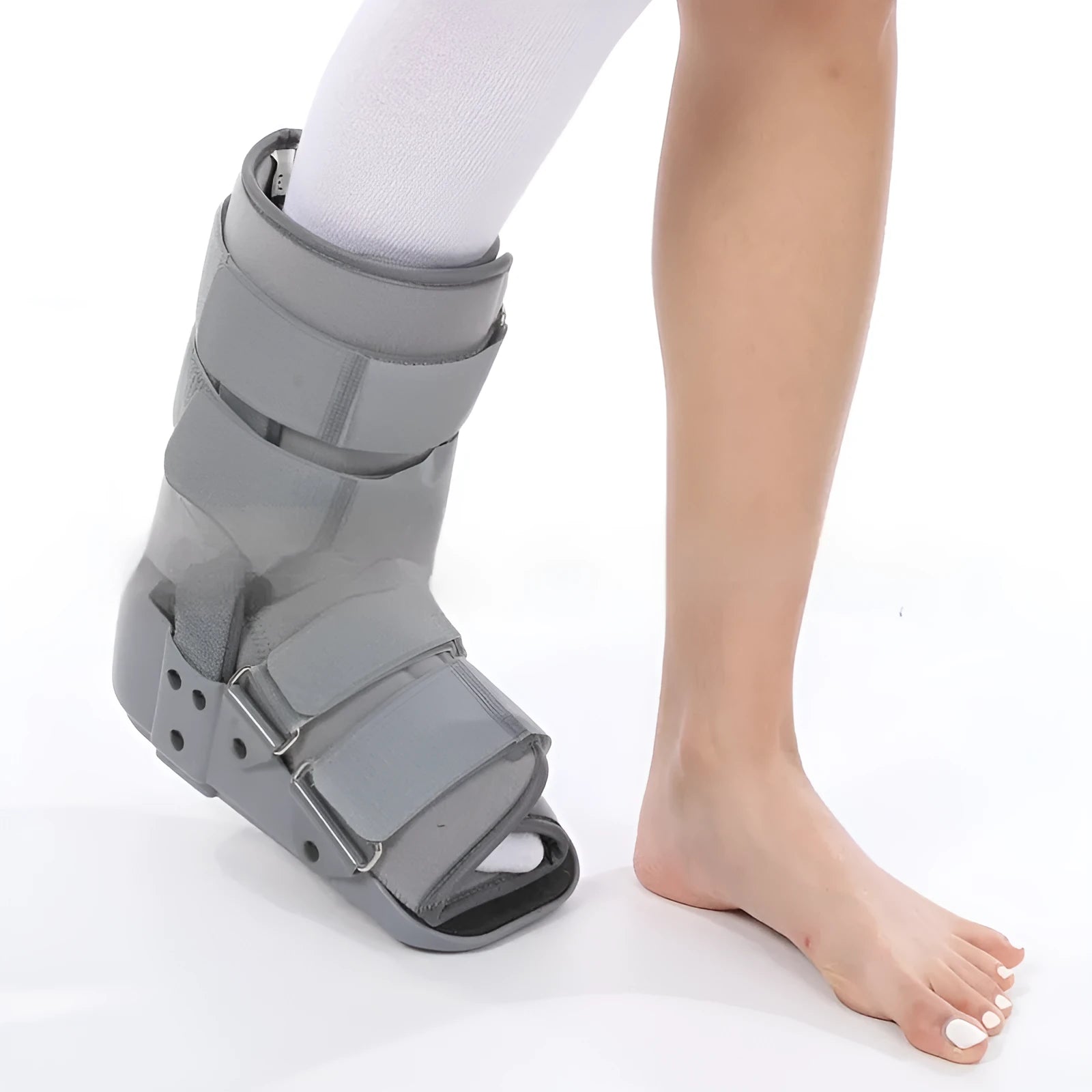 Achilles tendon rehabilitation walking boots in grey and black colours with adjustable straps