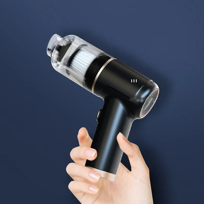 Black wireless car vacuum cleaner with multiple nozzle attachments and a USB charging cable on a car seat.