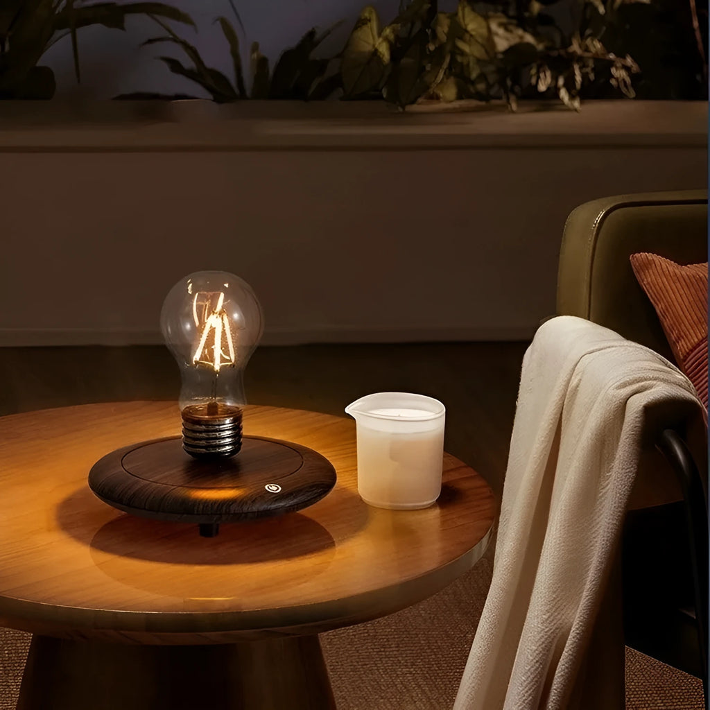 Iron art suspension bulb night lamp with black wood grain square base on desktop