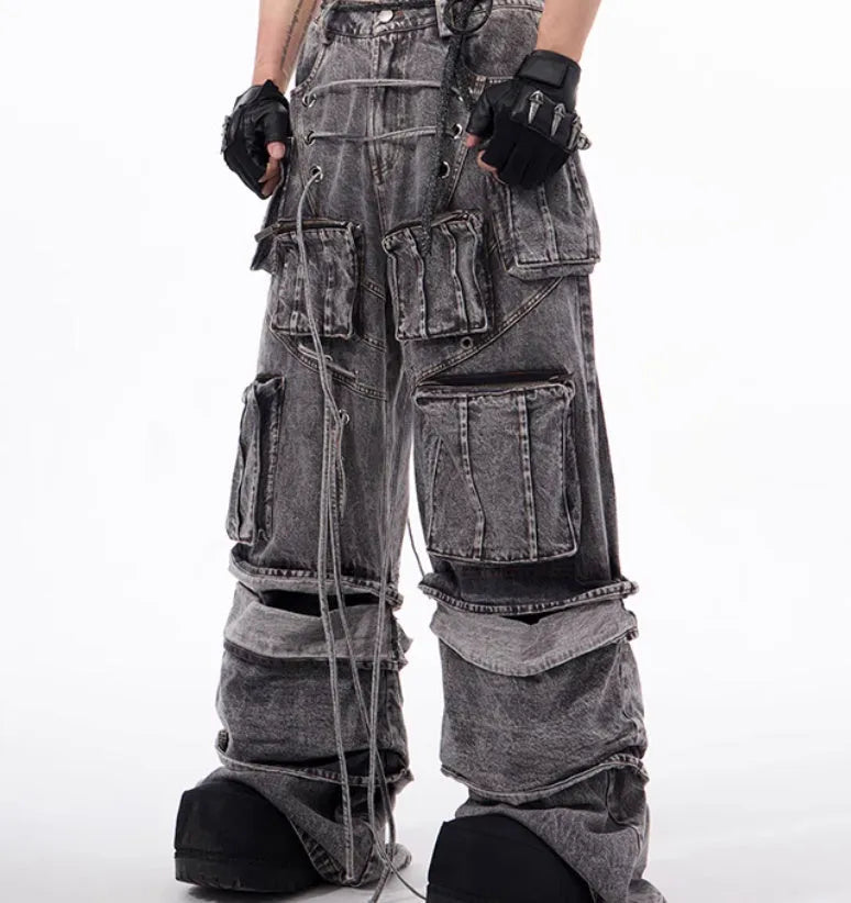 Grey distressed cotton denim men's overalls with rope stitching on the legs.