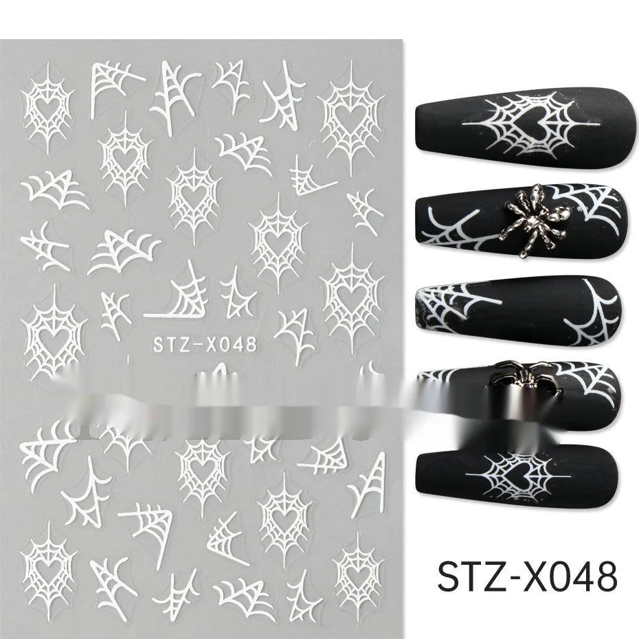 Cartoon love pattern nail art sticker decals in black and silver colours on a plastic sheet.
