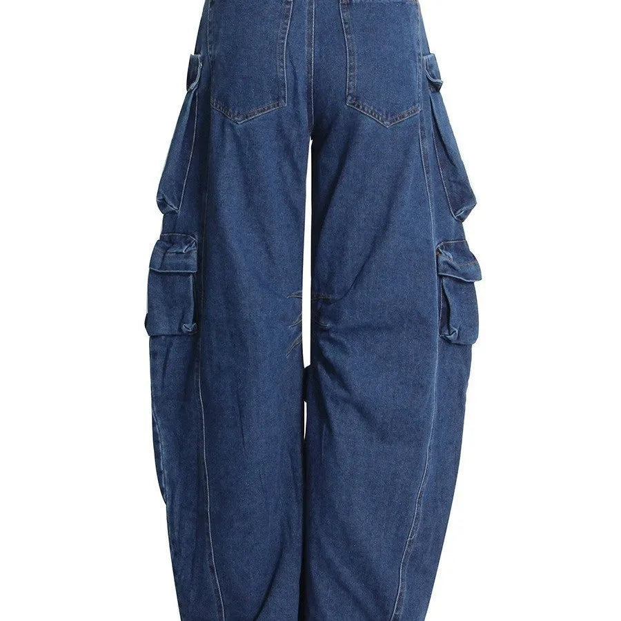 Dark blue distressed wide-leg high-waist jeans with multiple pockets on a mannequin.