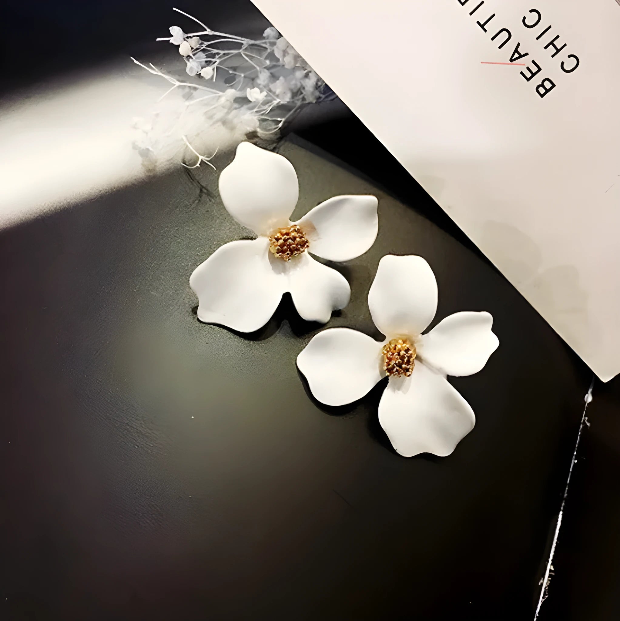 Flower stud earrings for women in alloy with white or pink electroplated finish
