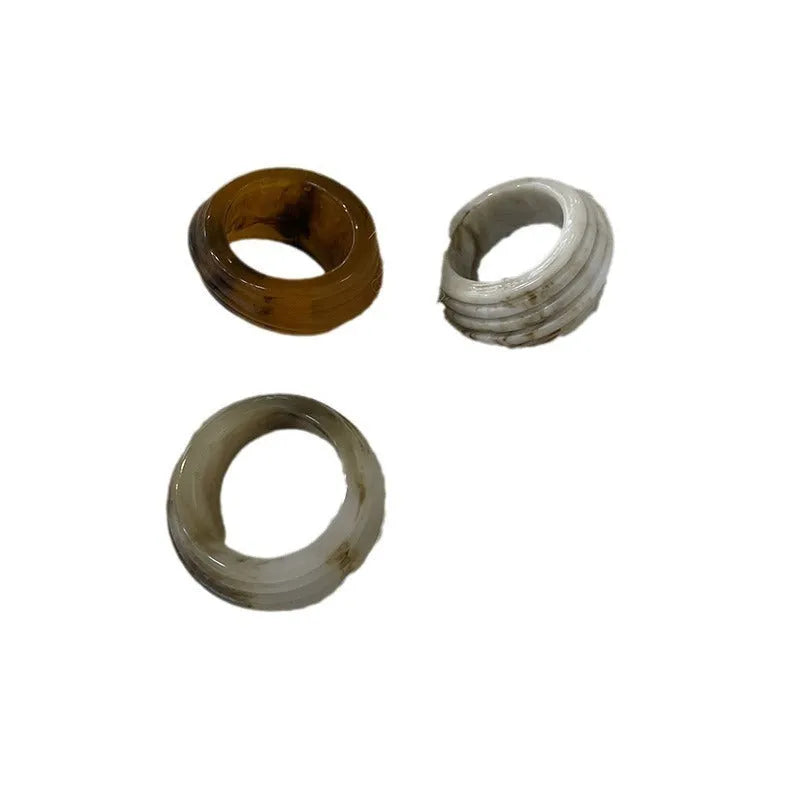 Chinese style irregular geometric resin ring with wide band design in Maillard brown colour