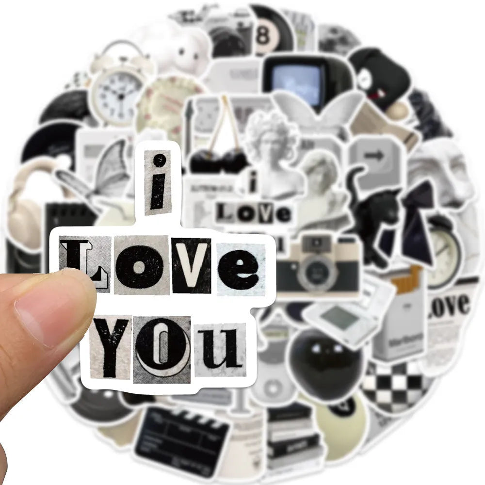 61-piece pack of black and white PVC waterproof decorative stickers for laptops and bottles.