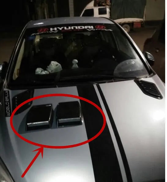 Black, white, and silver ABS plastic decorative simulation air vent for car interior styling.