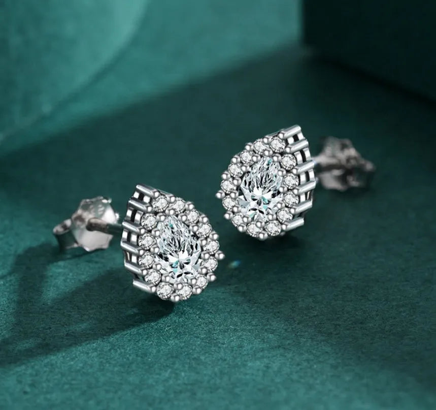 Pair of 925 sterling silver water drop shaped stud earrings with diamond process finish for women