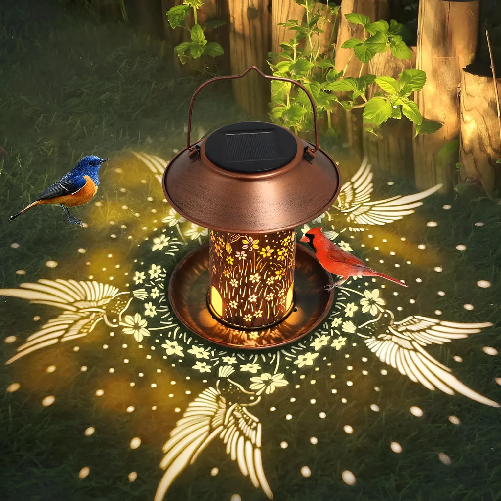Iron art solar lamp bird feeder with hummingbird pattern for garden decoration.