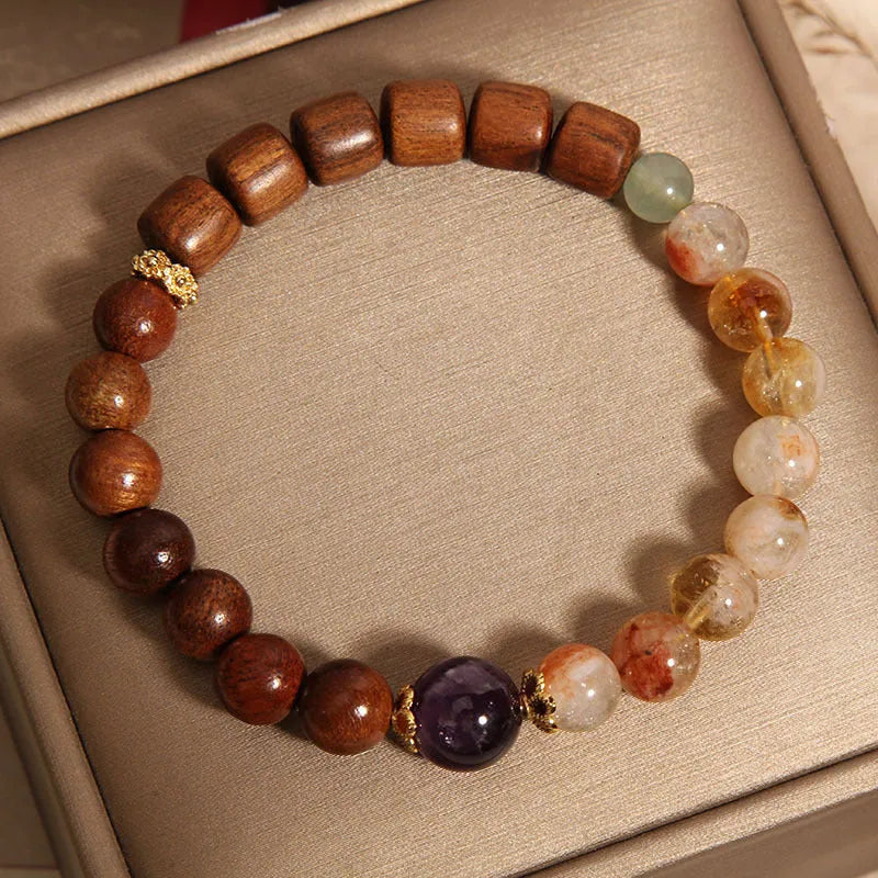 Women's pineapple yellow bracelet with yellow tower crystal, ebony amethyst beads, and pearl accents