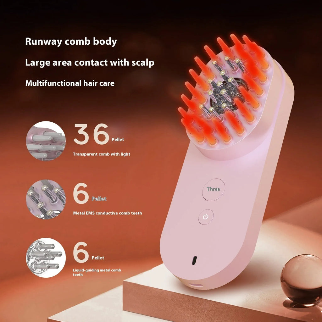 Pink and black smart massage comb for scalp care with red light therapy.