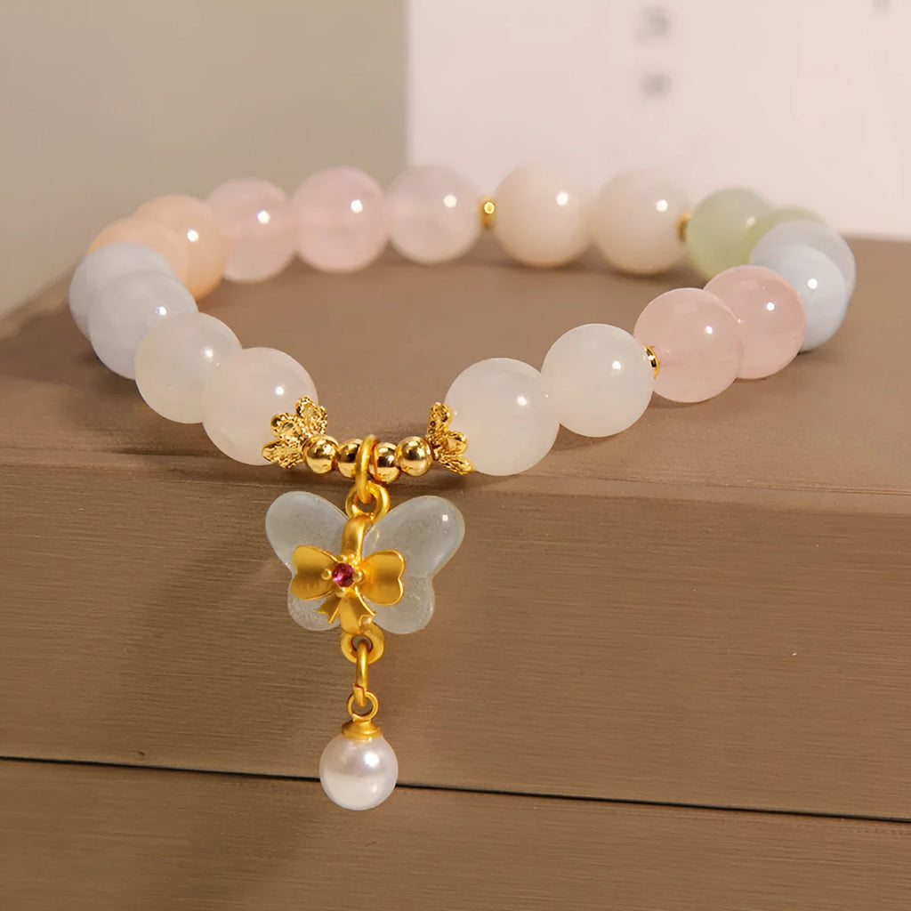 Women's crystal bracelet with a colourful morganite butterfly pendant in an original design.