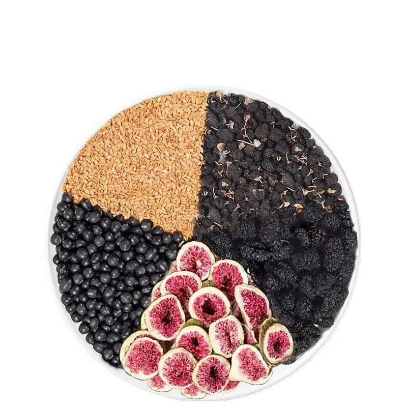 Packets of black wolfberry mulberry herbal tea with flaxseed and fig blend, shown with a free cup
