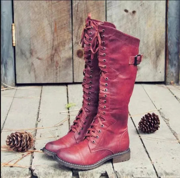 Women's chunky heel high leg boot in solid colour with round toe and low heel design