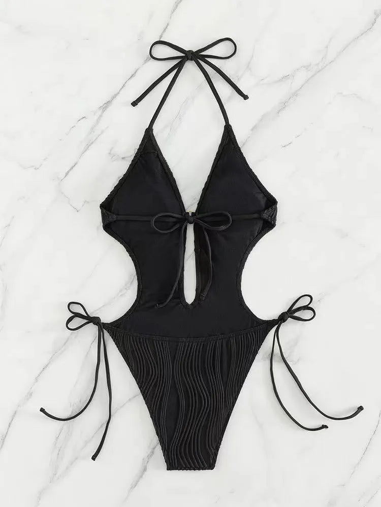 Women's black lace up triangle bikini swimsuit with solid colour polyester fabric