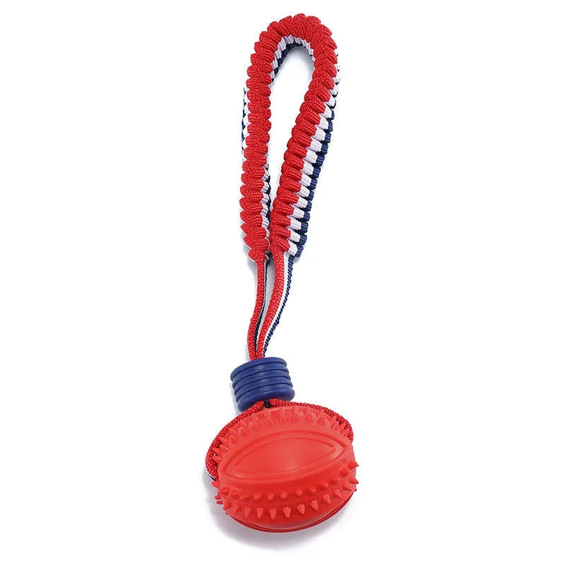 Blue or red natural rubber dog ball with rope toy for small and medium dogs featuring textured surface for teeth cleaning