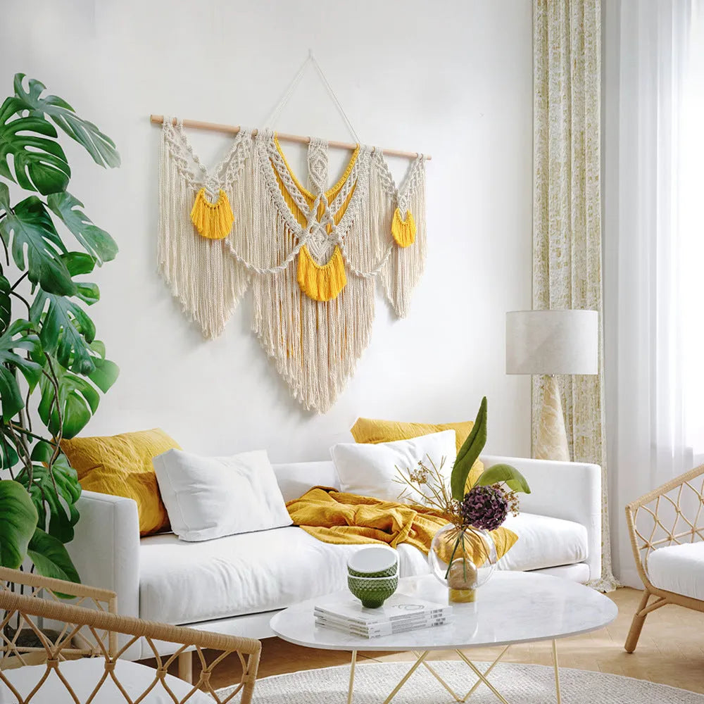 Hand-woven creamy white cotton tapestry with rectangular shape and textured surface