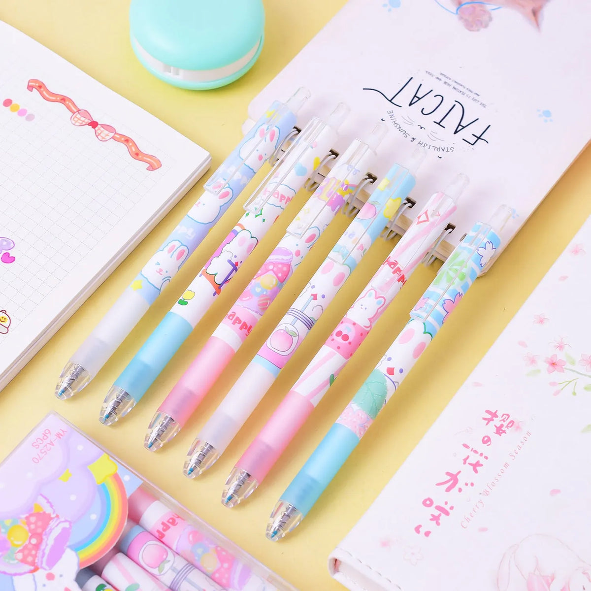 Set of six black pens with cartoon bunny design, showing 0.5mm fine tip nibs.