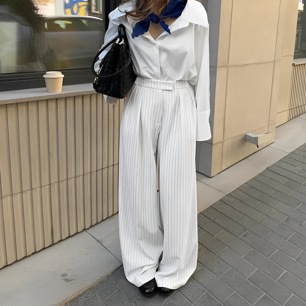 White striped wide-leg commuting trousers with zipper detailing on hanger