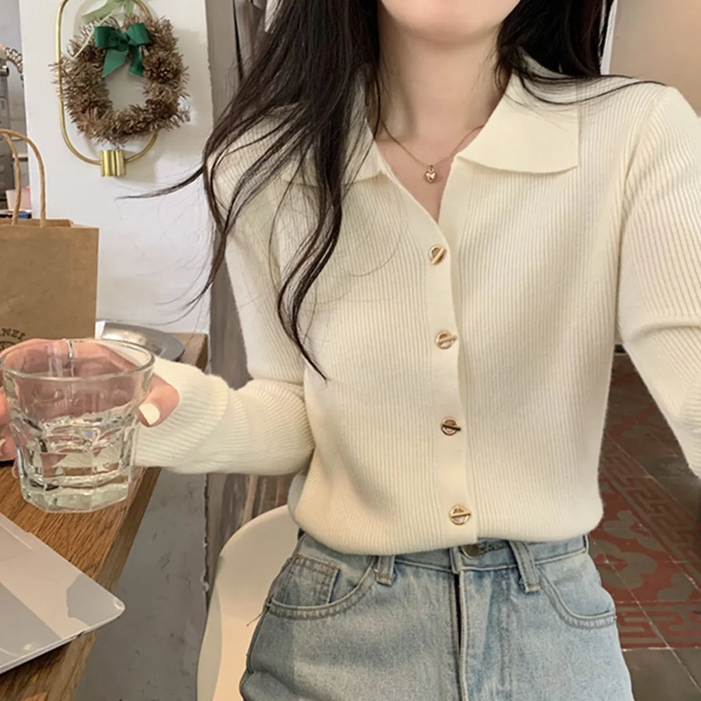 Long-sleeved oversized viscose cardigan in beige, black, oatmeal, green, or khaki, laid flat.