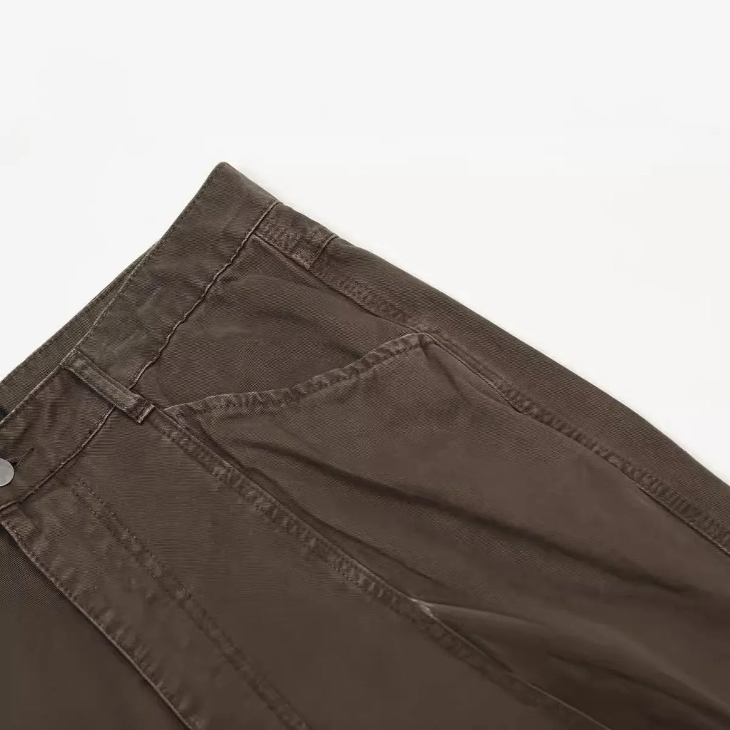 Men's loose straight-leg high-waist jeans in brown cotton fabric laid flat