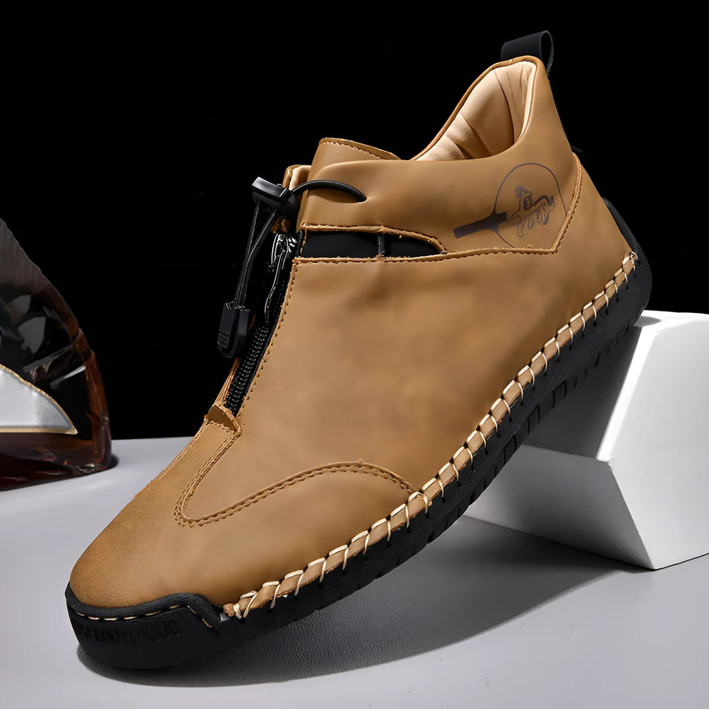 Men's casual leather shoes in black with a mid heel, rounded toe, and reinforced leather upper.