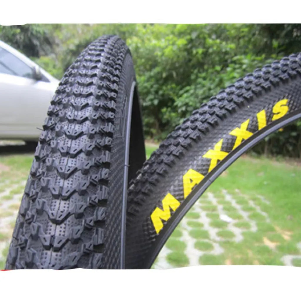 Mountain bike ultralight puncture proof tyre showing tread and white label sidewall option.