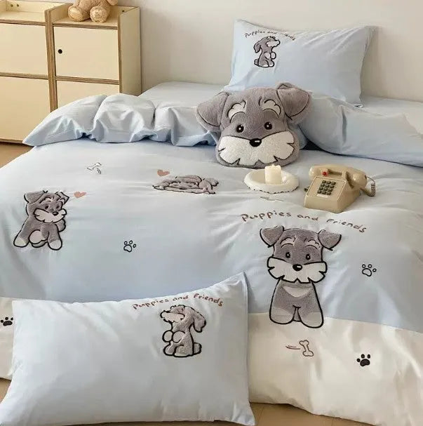 Cute Schnauzer cartoon embroidered bedding set with quilt cover, sheet, and pillowcases on bed