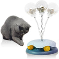 Blue and green PP plastic cat treat dispenser toy with a track ball on a textured base