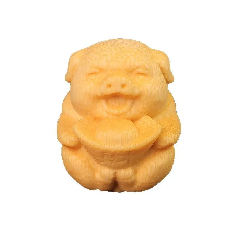 Small solid bamboo carving ornament in the shape of a cute pig ingot, 4cm height, natural wood colour