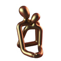 Modern resin couple sculpture in milky white or gold finish for bookshelf and desk decor