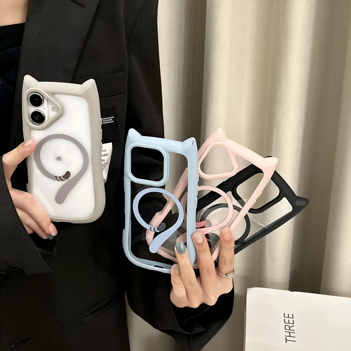 Transparent acrylic TPU phone case with magnetic suction for IPhone17 models in black, blue, grey, and pink.